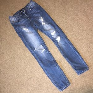 Distressed ripped jeans